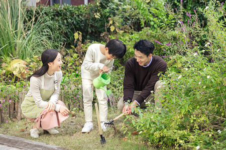 亲子种花一家三口花园种花背景