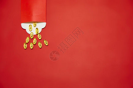 新年静物红包里的金元宝图片