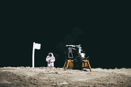 月球太空太空登月创意小人微距背景