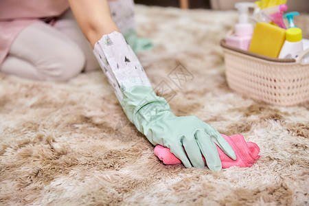 室内清扫家庭主妇居家清洁打算卧室地毯特写背景