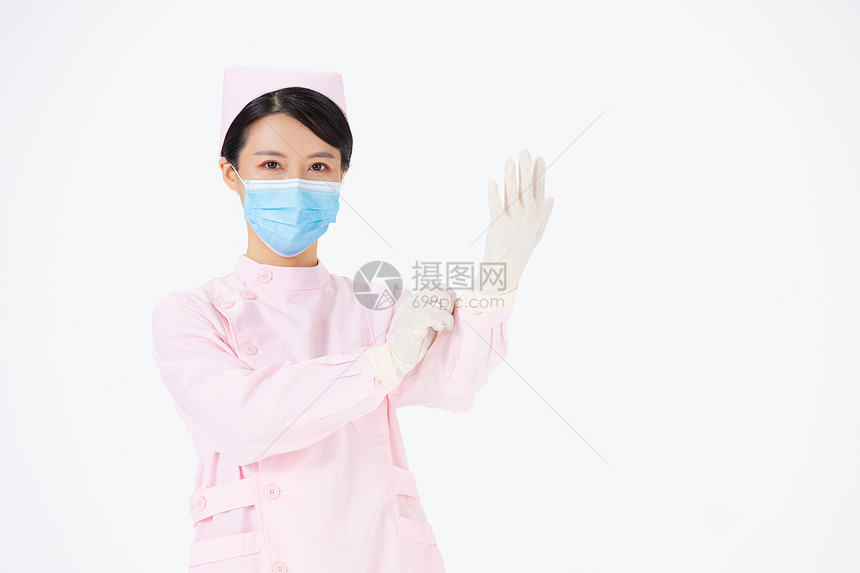 戴手套的医护人员图片