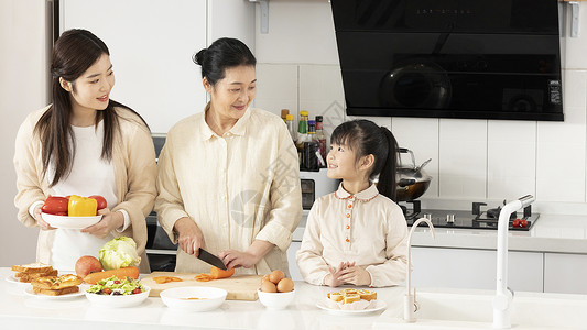 妈妈在厨房做饭祖孙三代在厨房一起做饭背景