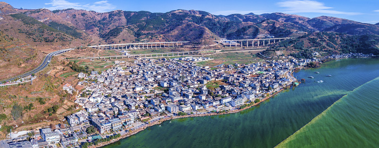 全景航拍大理康廊村民宿建筑高原交通背景图片