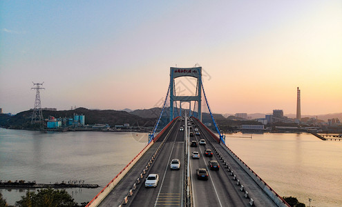 广东汕头海湾大桥日落背景图片
