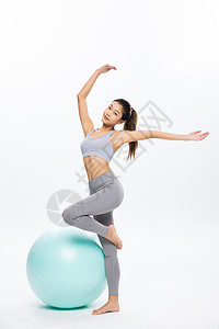 女性瘦身运动瑜伽球锻炼背景图片