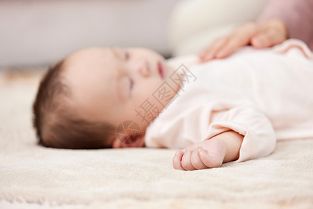 可爱小宝宝睡着的婴儿小宝宝手部特写背景