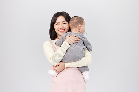抱着小婴儿的月嫂形象母婴高清图片素材