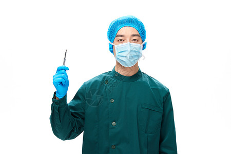男性手术服医生拿着手术剪刀中国人高清图片素材
