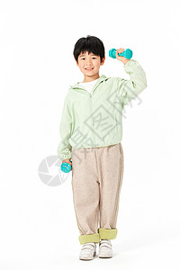 用哑铃健身运动的小男孩图片