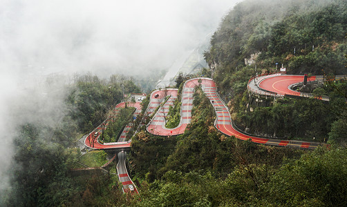 航拍丛林满山绿野的公路背景