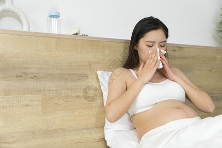 居家生病感冒的孕妇图片