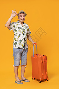 拉着行李箱旅行的老人形象图片