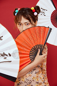 中国风国潮美女拿折扇背景图片