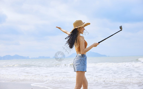 女人海边自拍时尚女性海边直播背景