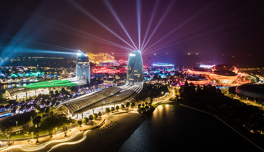 中国海南海南海花岛双子塔酒店夜景灯光秀背景
