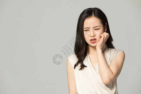 牙龈痛年轻女性牙疼口腔疾病背景