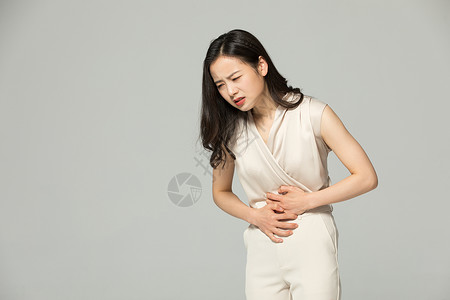 腹部疼痛的女性肚子痛图片
