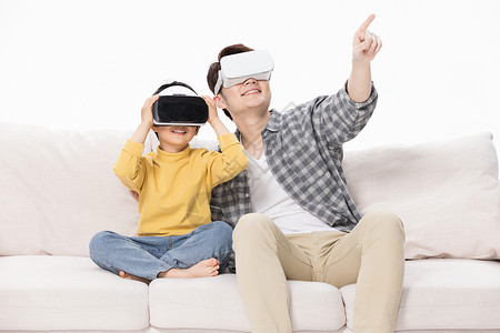 VR娱乐父子居家戴VR眼镜玩游戏背景