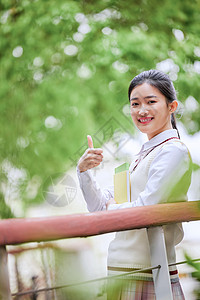 穿校服女学生穿校服的女高中生点赞背景