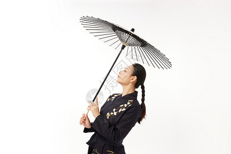 古风剑客素材国潮古风剑客美女举着伞背景