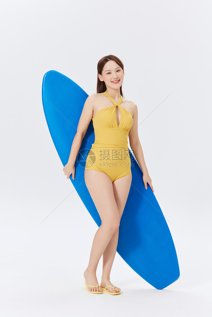 夏日泳装美女与冲浪板图片