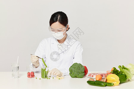 服装搭配素材女营养师对蔬菜进行质检背景