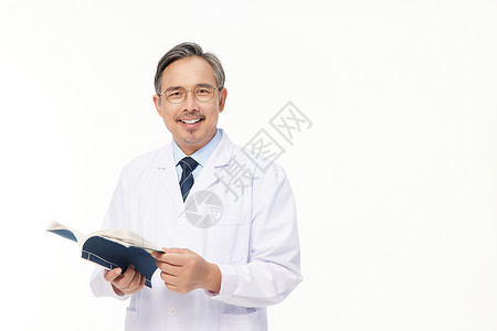 男中医阅读医书图片素材
