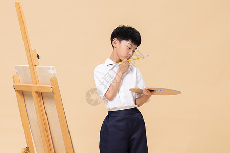 学习绘画遇到瓶颈的小男孩图片