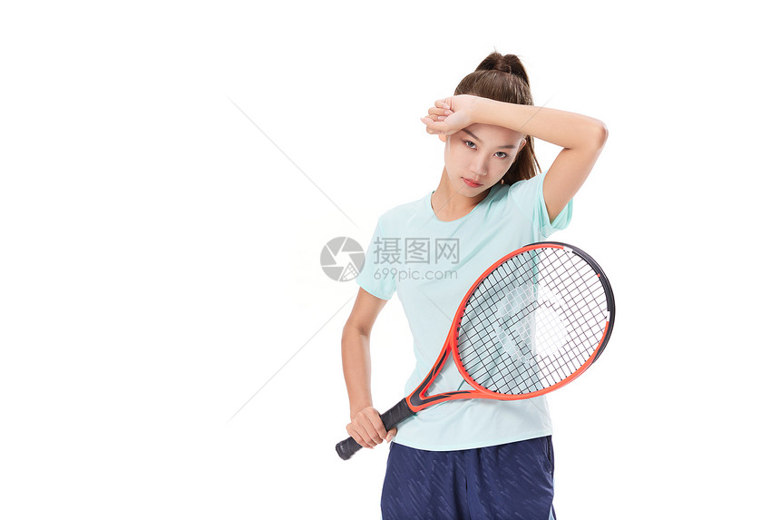 打网球的女性运动员图片