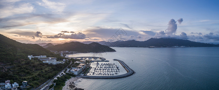 游艇俱乐部晚霞下的深圳浪骑游艇会背景