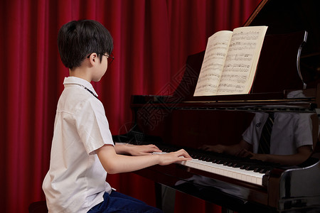 钢琴儿童儿童学生学习弹奏钢琴曲背景