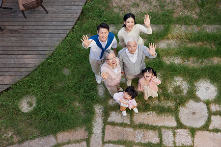 俯拍中秋节一家人团圆团聚打招呼背景图片