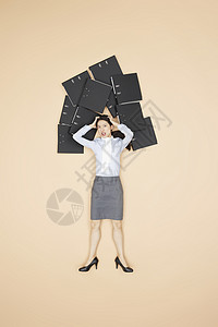 创意俯拍商务女性职场压力图片