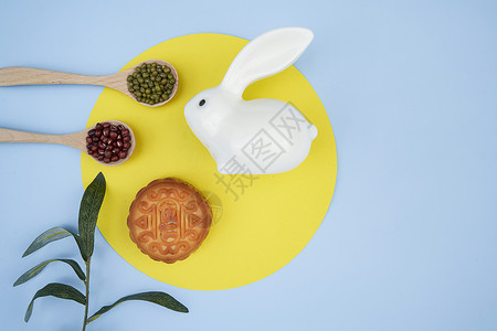 月亮与兔子边框中秋节月饼创意背景背景