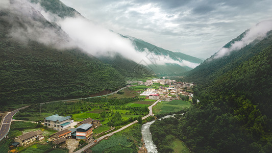川西高原山谷村落背景图片