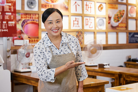 面包店宣传中年女店员店门口宣传背景