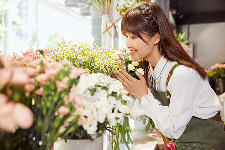 鲜花店折页鲜花店美女销售员形象背景