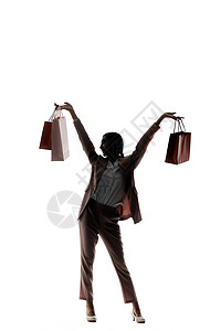 双手提着购物袋的女性背景图片