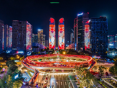 国庆焕新季航拍成都新地标交子之环与金融城双子塔夜景背景