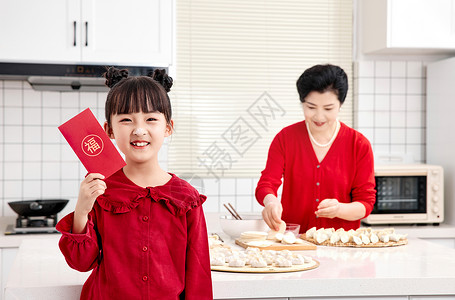 唐装小孩春节小孩展示新年红包背景