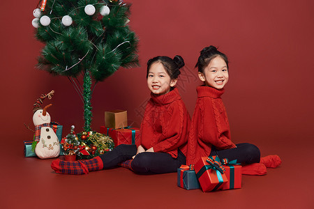 圣诞儿童双胞胎小女孩过圣诞节背景