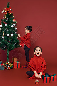 双胞胎小女孩过圣诞节背景图片