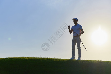 运动球剪影粒子打高尔夫的男性剪影背景