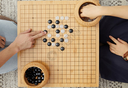 益智类两个人在围棋对弈背景