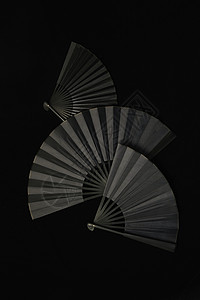 黑背景极简时尚中国风折扇屏保图片