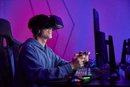 玩网游电竞选手戴VR眼镜打游戏背景