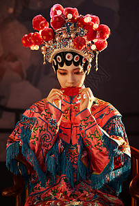 国粹戏曲京剧美女使用口红纸背景图片