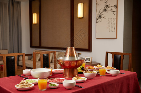 中式宴席中式家庭年夜饭火锅铜锅涮肉背景