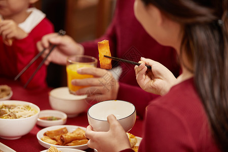 便夜饭年夜饭团圆饭夹菜特写背景