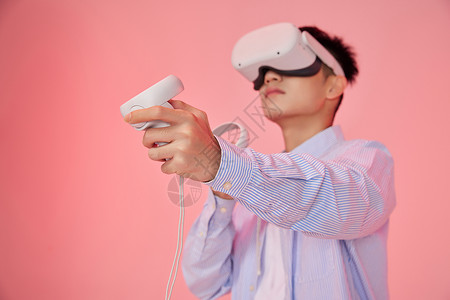 年轻男性体验vr虚拟现实技术背景图片